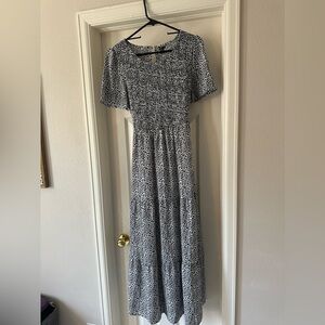 Mid length dress. Never worn.